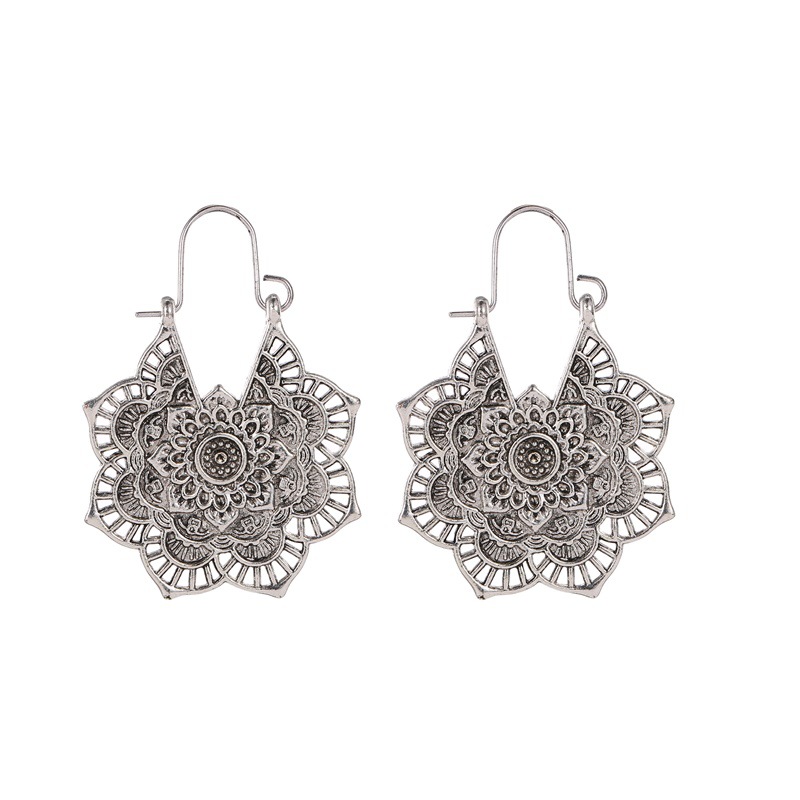 Ethnic Style Earrings Exotic Flavor Metal Hollow Flower Earrings Bohemian Carved Palace Style Ear Drops