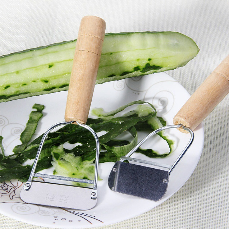 Two-dollar store wooden handle planer peeler stainless steel fruit and vegetable peeler vegetable and fruit peeling knife