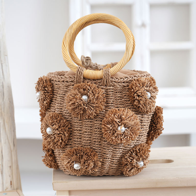Summer fresh women's handbag, handmade woven pearl flower decoration bucket bag, round bracelet straw bag
