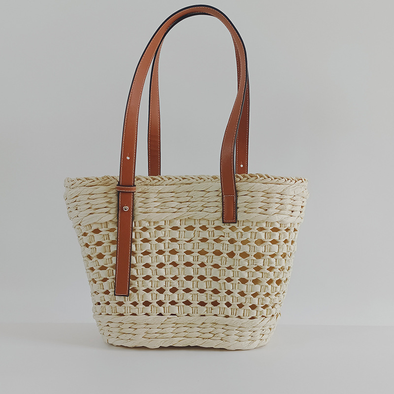 Straw woven bag women's 2026 new hollow handmade woven bag style single shoulder handbag seaside vacation beach bag