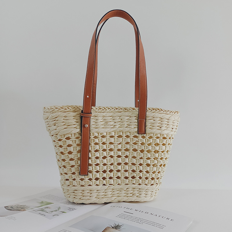 Straw woven bag women's 2026 new hollow handmade woven bag style single shoulder handbag seaside vacation beach bag