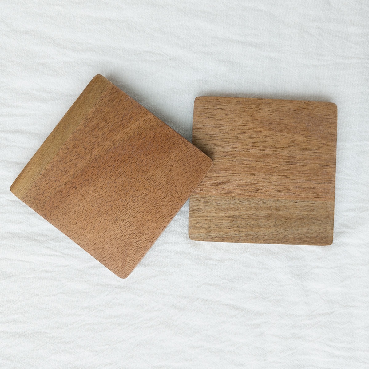 Wooden coaster four-piece set commercial acacia wood black walnut splicing laser carving round irregular heat insulation coaster