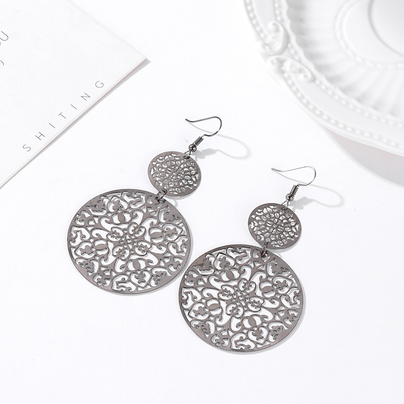 Ethnic Style Earrings Exotic Flavor Metal Hollow Flower Earrings Bohemian Carved Palace Style Ear Drops