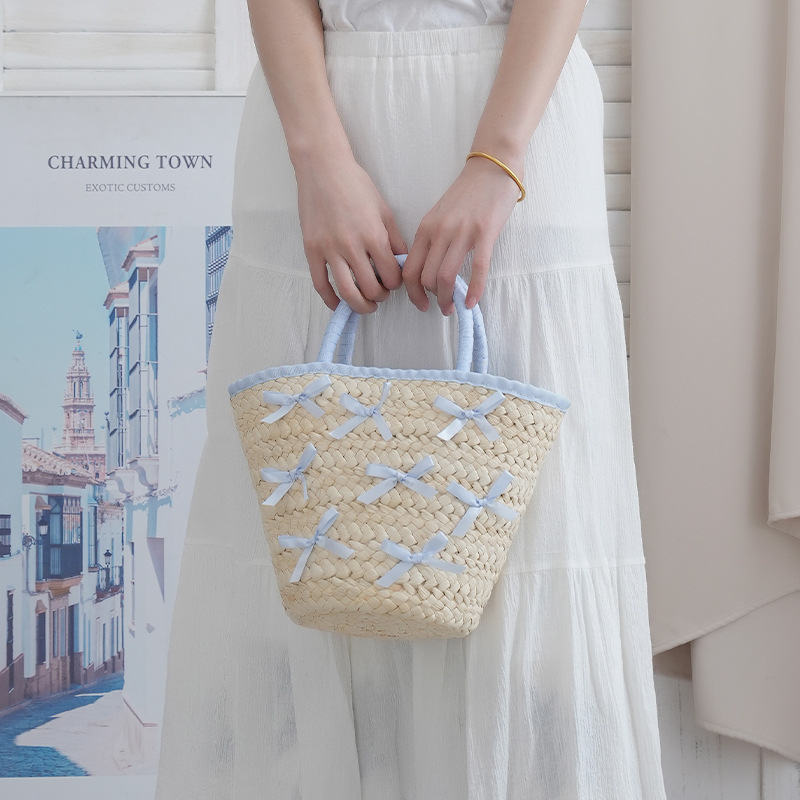 Korean chic urban minimalist straw woven bag with bow, large capacity bucket shoulder bag, beach vacation bag