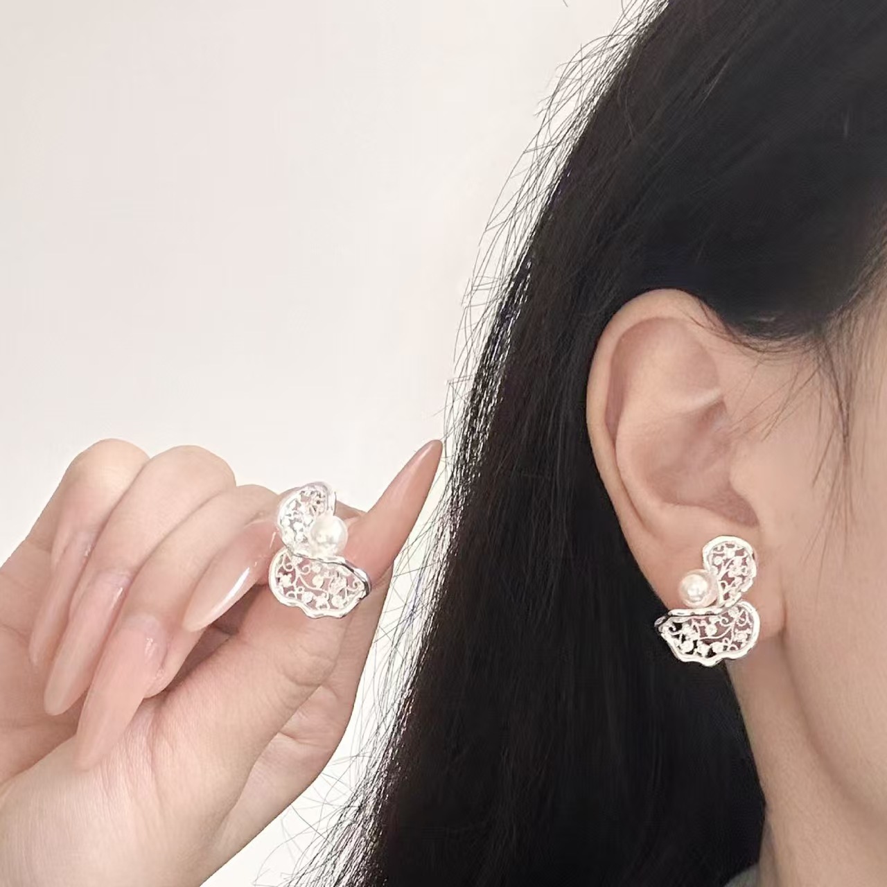 Hollow Flower Pearl Stud Earrings for Women 2026 New Earrings Niche Design Ear Accessories