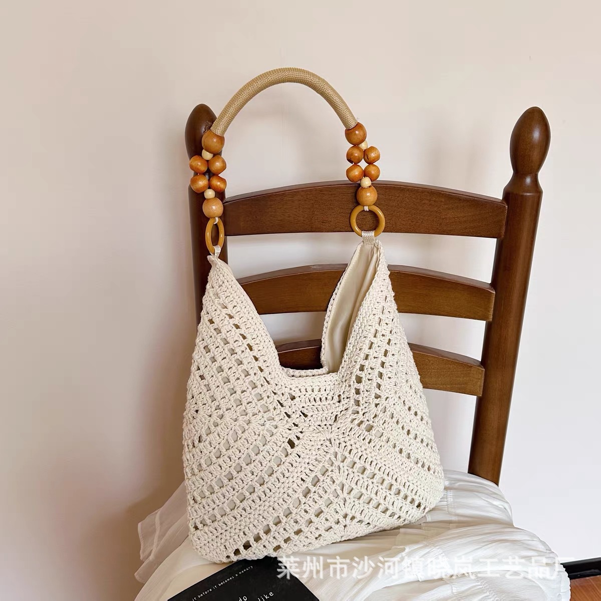 Summer seaside beach bag women's 2026 new large capacity hollow woven shoulder bag handbag tote bucket bag